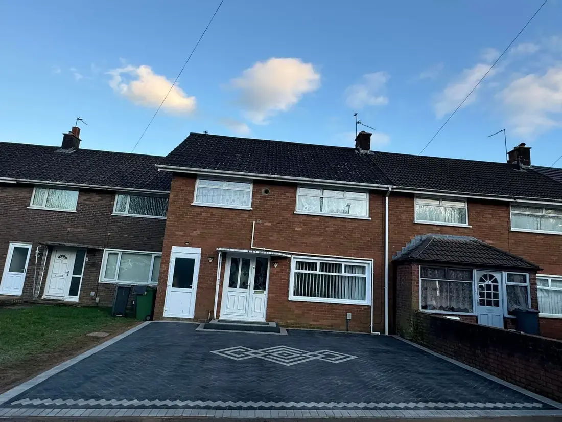 terraced brick houses with decorative block paved driveway Burton Trent